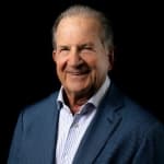 Gino Giosue Milani from Deakin Milani Solicitors and Notary